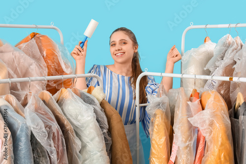 Female worker of dry-cleane...