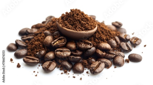 A pile of coffee beans next to a bowl of ground coffee. Perfect for coffee shop or cafe concept