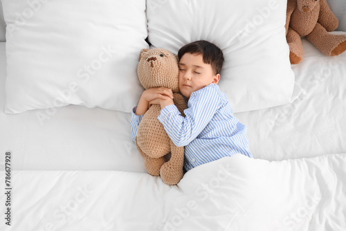 Cute little boy with teddy ...