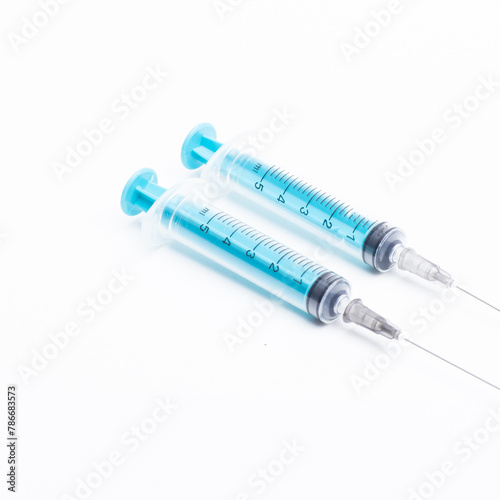 Disposable plastic syringe prepared for injection and vaccination in the hospital. The concept of medicine and health	