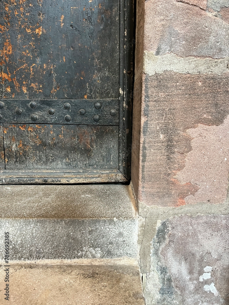 Naklejka premium The interior of the Church of St. Lorenz in Nuremberg, Germany. Part of the parish door with threshold, Bavaria, Germany