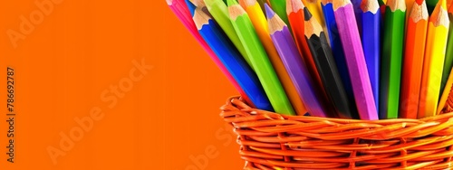 Bright Basket Overflowing with Multicolored Artistic Pencils and Crayons