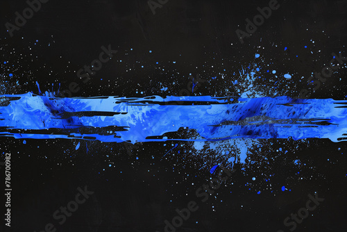 Dynamic Blue Paint Strokes and Splatters on a Dark Background