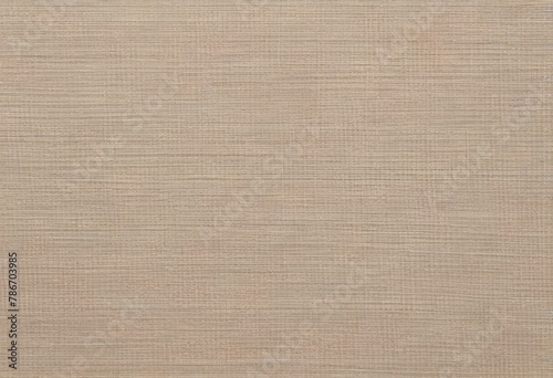 Close-up texture of a beige linen fabric with visible weave details