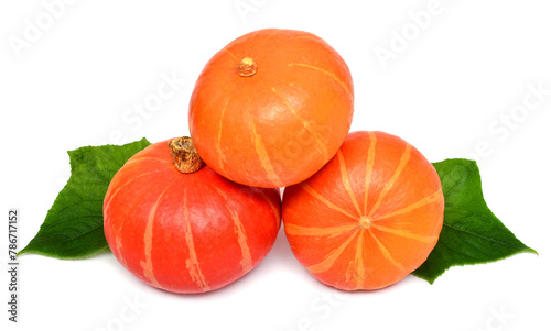 Three pumpkins with leaves isolated on white background