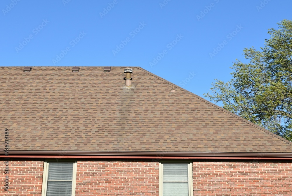 Shingles on the Roof of a Brick House