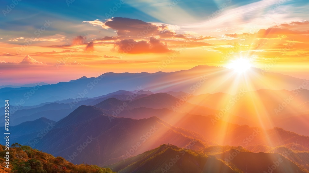 Picturesque sunrise over mountain range with vivid colors