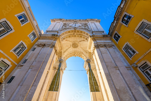 The historic Arco da Rua Agusta arch on Praça do Comércio square in the Baixa city center district of Lisbon, Portugal. 