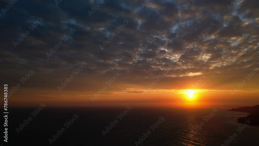 A cinematic landscape of nature in soft sunlight shot by a drone. Natural clouds at sunset from a bird's eye view. Sunset wavy seascape in tropical paradise Vietnam, Indonesia, Asia. Slow motion in 4K A cinematic landscape of nature in soft sunlight shot by a drone. Natural clouds at sunset from a bird's eye view. Sunset wavy seascape in tropical paradise Vietnam, Indonesia, Asia. Slow motion in 4K