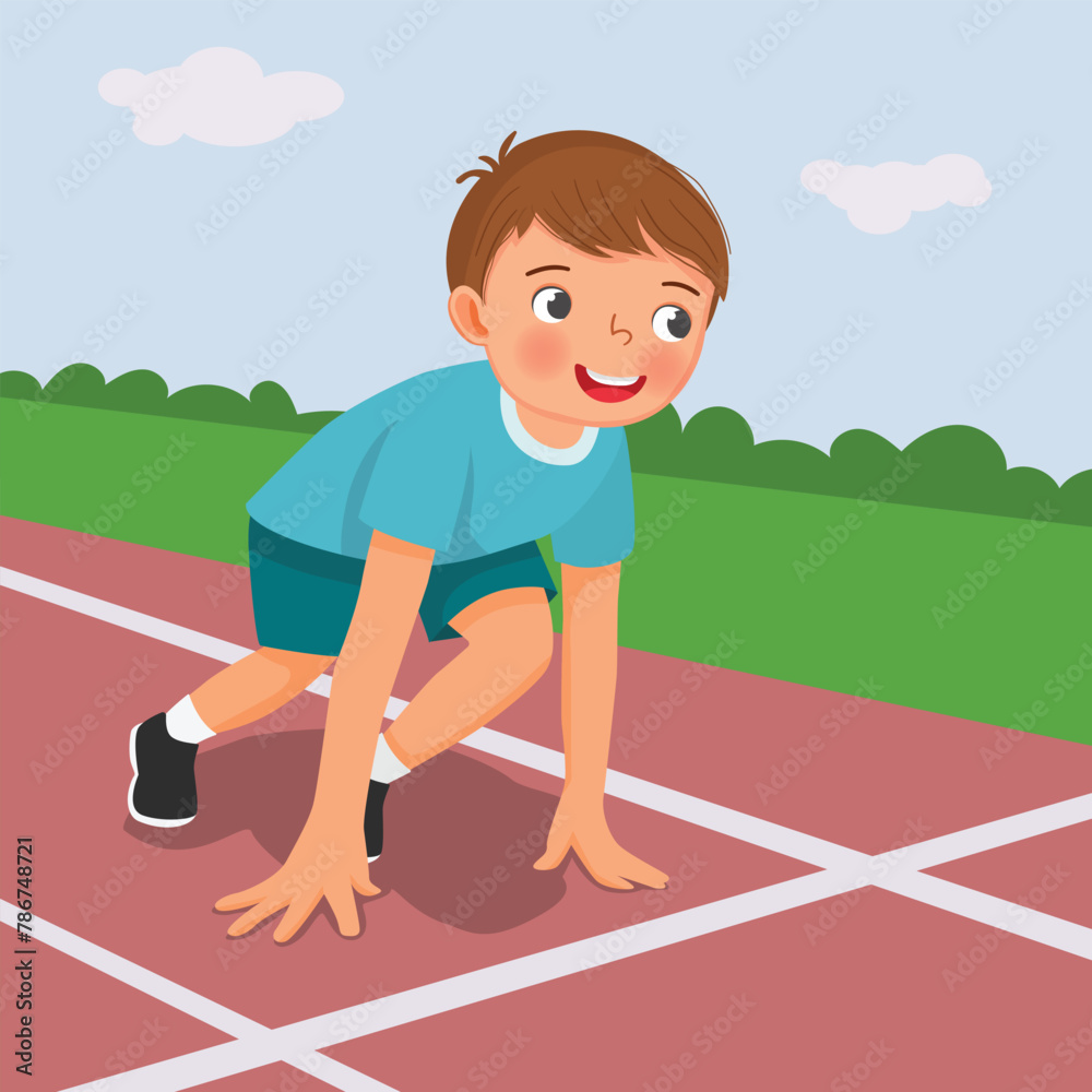 Cute little boy prepare to run on starting position at race track