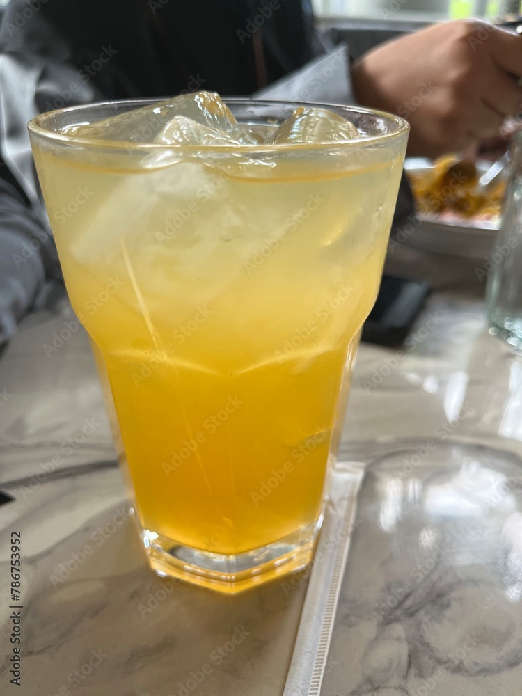 orange juice with ice cubes orange juice with ice cubes