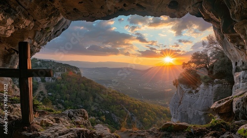 Sunset view of a wooden cross from a cave