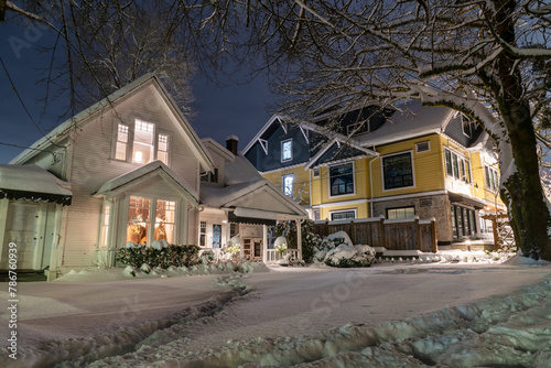 Luxury house in Vancouver, British Columbia, Canada at night after a snow storm.