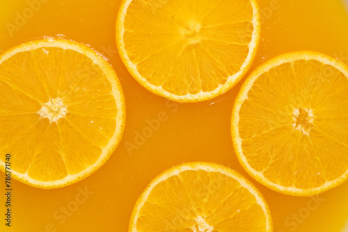 Orange slices in orange juice.Refreshing citrus fruit.