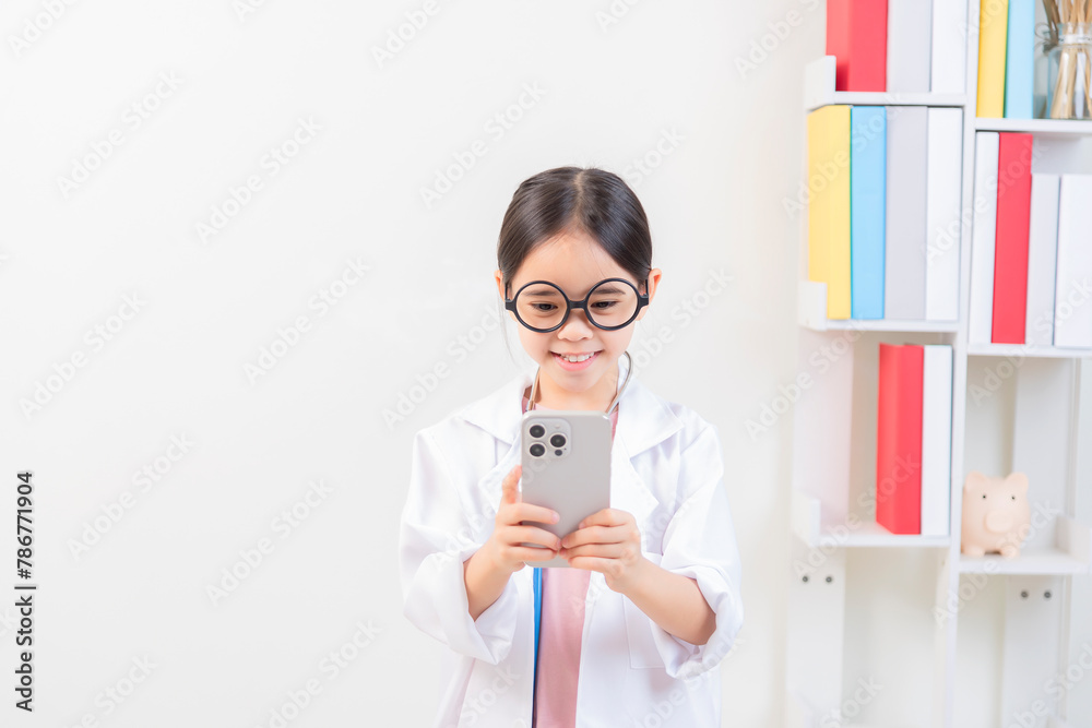 Cute little girl asian with stethoscope playing doctor Cute little girl asian with stethoscope playing doctor
