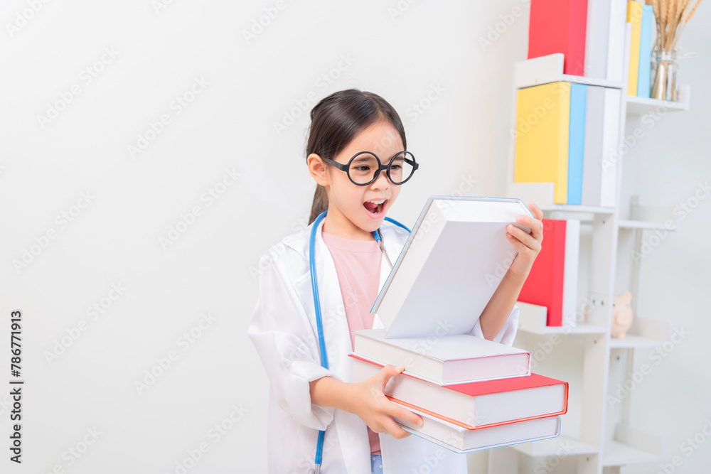 Cute little girl asian with stethoscope playing doctor Cute little girl asian with stethoscope playing doctor