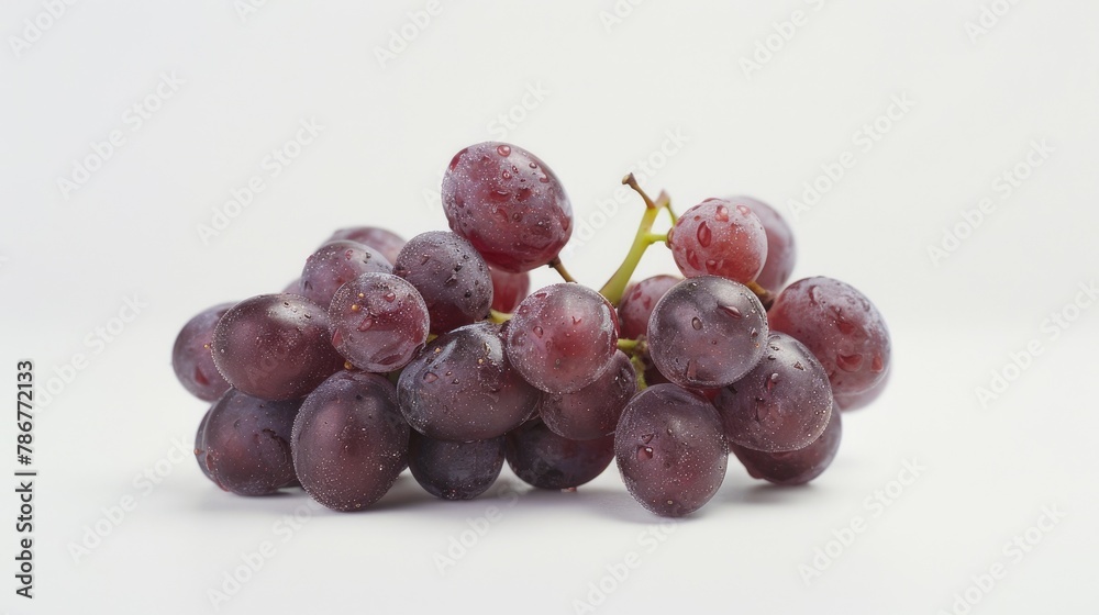 Red grapes against a white backdrop