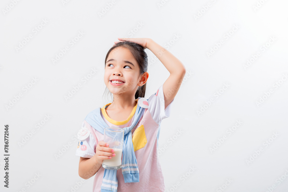 Little Asian girl Image of Asian child drinking milk Little Asian girl Image of Asian child drinking milk