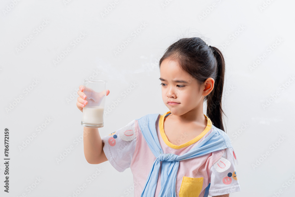 Little Asian girl Image of Asian child drinking milk Little Asian girl Image of Asian child drinking milk