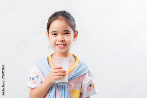 Little Asian girl Image of Asian child drinking milk