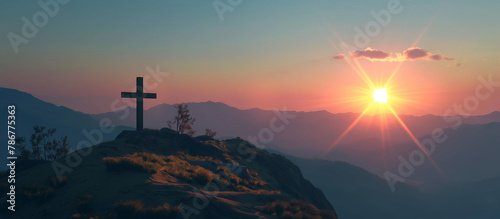 A crosses on the top of the mountain at sunrise, religion concept. 