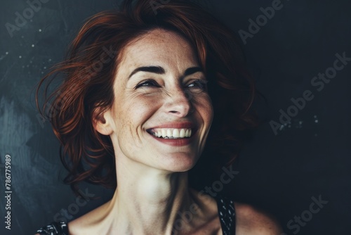 Portrait of beautiful red-haired woman with freckles. © Chacmool