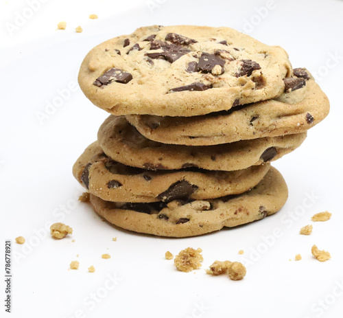 STACK OF CHOCOLATE CHIP COOKIES ON WHITE BACKGROUND