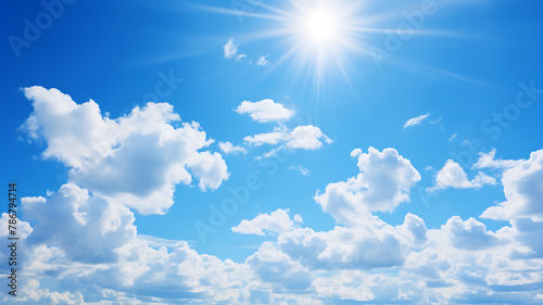 Blue sky background with tiny clouds. Cumulus white clouds in the clear blue sky