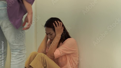 Asian woman abused by her husband
