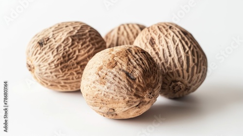 Nutmeg placed against a white backdrop