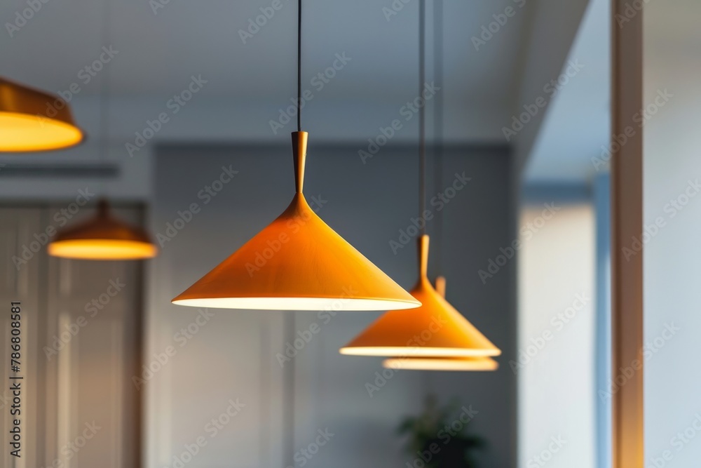 Ceiling adorned with three white light bulbs suspended in a row. Minimalist and illuminating interior decor Ceiling adorned with three white light bulbs suspended in a row. Minimalist and illuminating interior decor