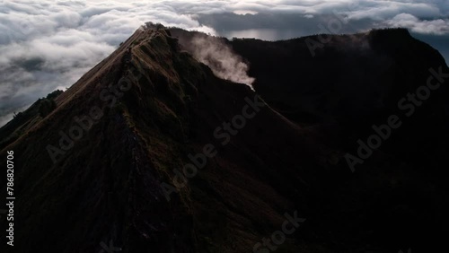 Hot Steam From Mount Batur Volcano Crater In Bangli Regency, Bali, Indonesia. - aerial shot photo