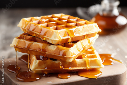  Homemade Belgium waffles with maple syrup photo