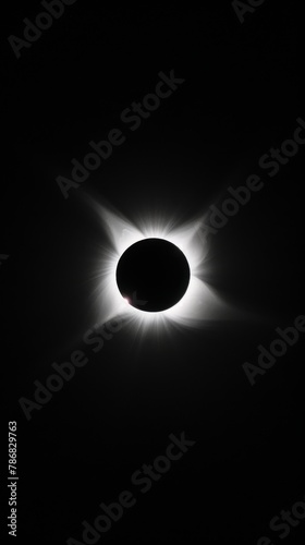 Brilliant solar eclipse with dramatic setting. A stunning view of a solar eclipse surrounded by powerful sunbeams, rays piercing through a dynamic setting, symbolizing awe and wonder