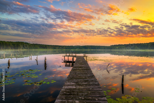 Beautiful summer sunset over the lake © Piotr Krzeslak