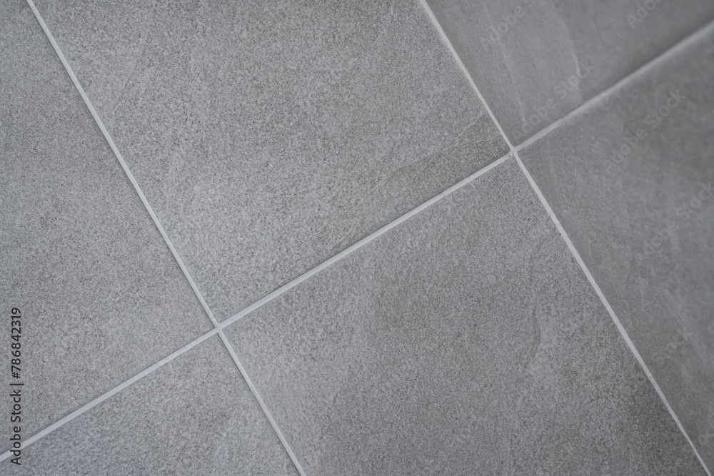 Fototapeta premium Gray tile is an interior material that goes well anytime, anywhere