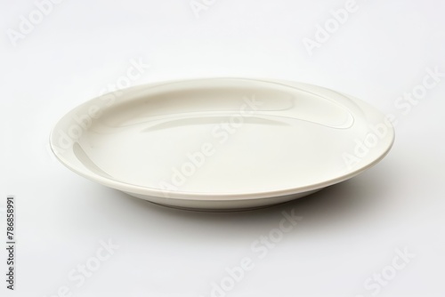 Empty ceramic round plate isolated on white . photo on white isolated background