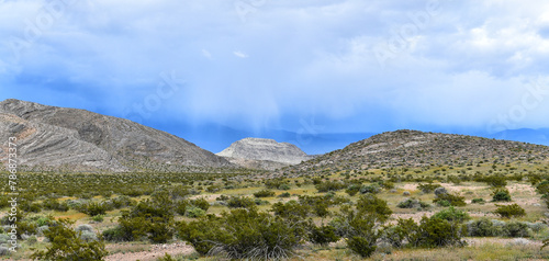 Distance Showers over the Nevada desert along the Bob Rudd Memorial Highway.