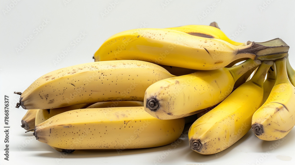 A bunch of ripe bananas exhibits a creamy yellow hue with subtle brown spots, indicative of natural sweetness, perfect for a nutritious snack or culinary creation.
A bunch of ripe bananas exhibits a creamy yellow hue with subtle brown spots, indicative of natural sweetness, perfect for a nutritious snack or culinary creation.