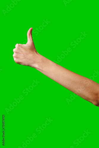 Person Giving a Thumbs Up Gesture Against a Green Screen Background