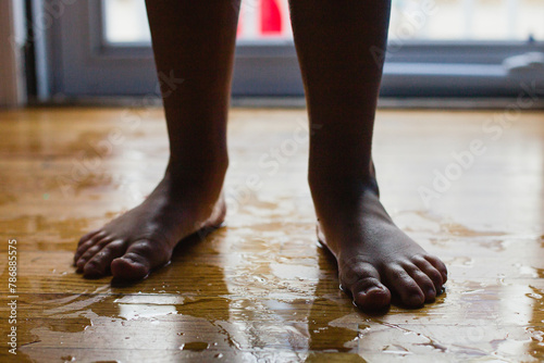 Wet feet on wood floor