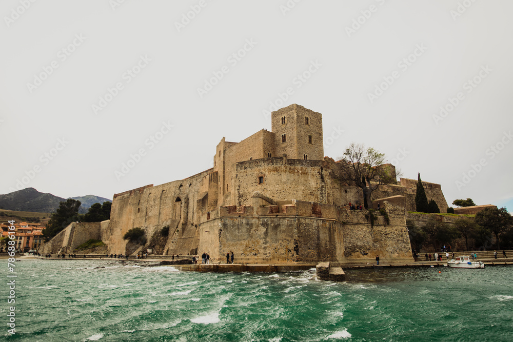 Castle on the coast of the Sea of France during a cloudy day