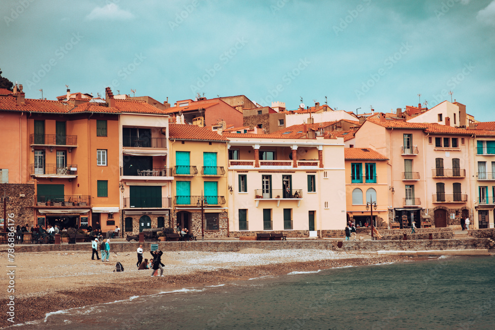 Houses in front of a beach on the French coast. Collioure, France.