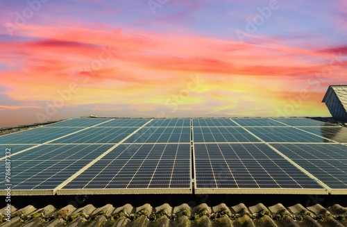 Solar panels producing clean energy on a roof of a residential h photo