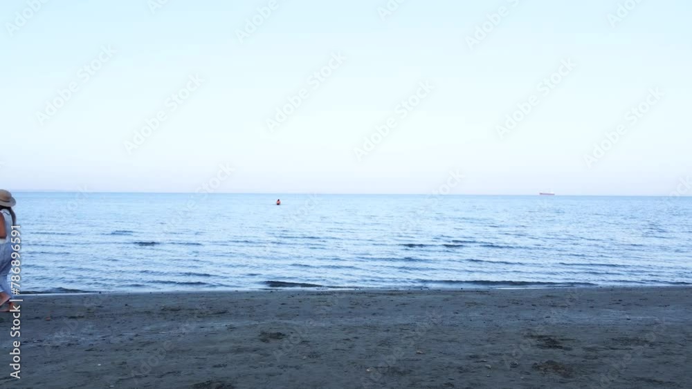 Couple Runing Freely in the Beach Sand after Sunset Couple Runing Freely in the Beach Sand after Sunset