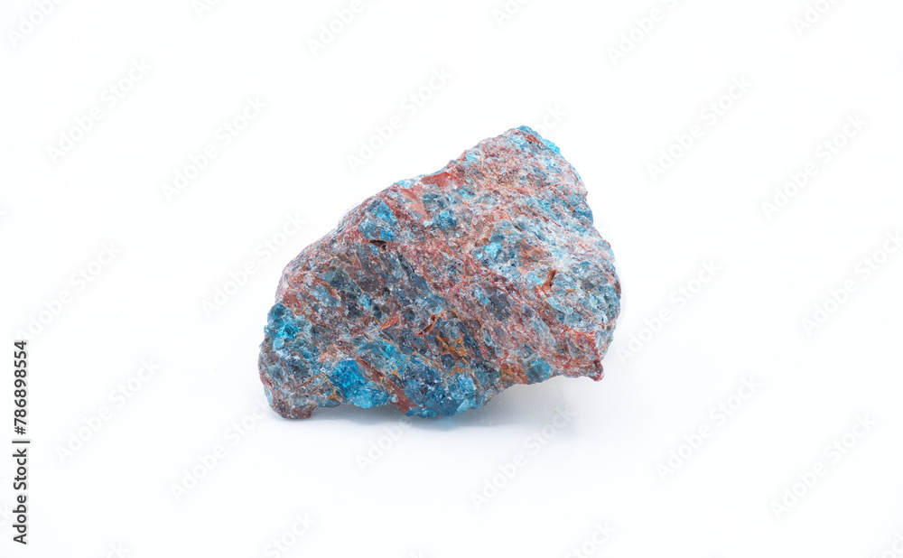 Papagoite mineral composed of calcium copper aluminum silicate hydroxide a rare gemstone in Arizona United States. Isolated on white background Papagoite mineral composed of calcium copper aluminum silicate hydroxide a rare gemstone in Arizona United States. Isolated on white background
