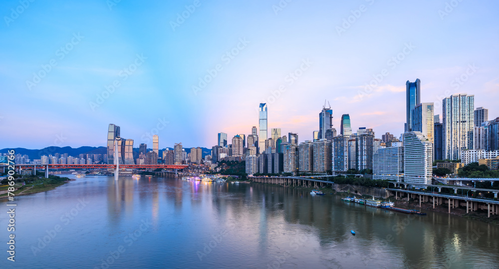 Panoramic view of city skyline and modern buildings in Chongqing at dusk. Famous city landmarks in China.