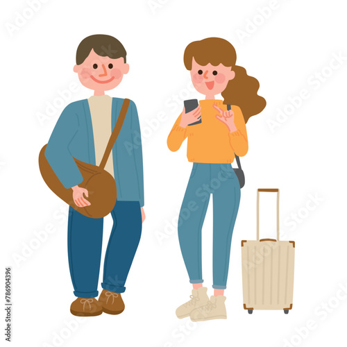 旅先でスマホを見るカップル