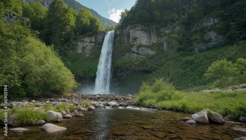 Beautiful waterfall amid the mountains  ancient summer woodland