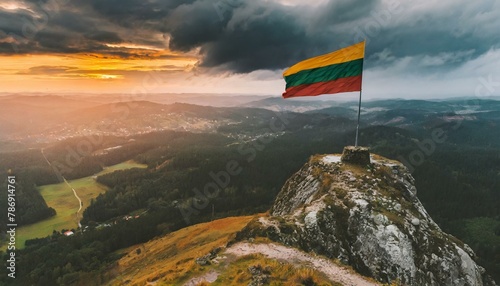 The Flag of Lithuania On The Mountain. photo